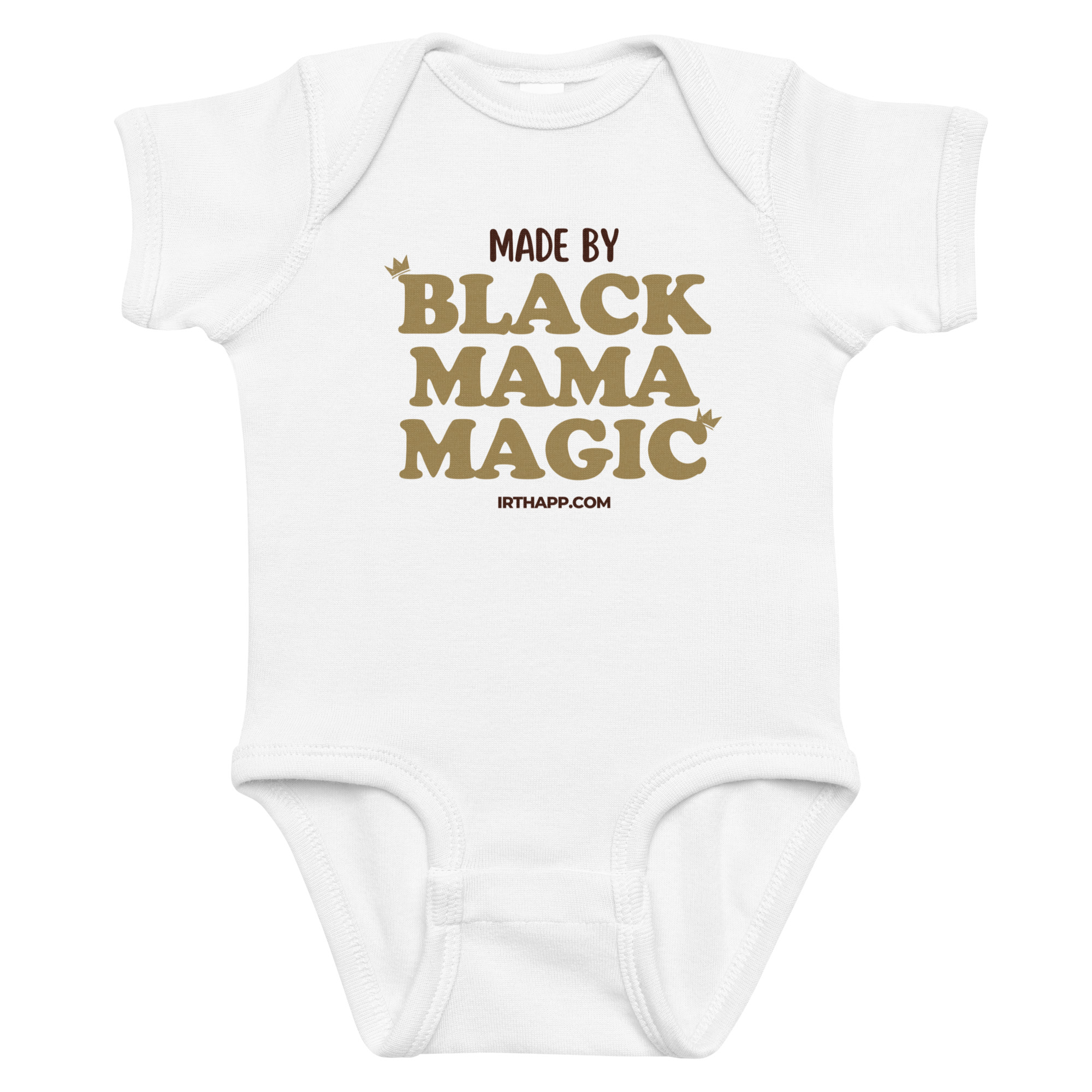 A white onesie featuring the text 'MADE BY BLACK MAMA MAGIC' in bold, gold lettering.